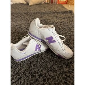 New Balance 442 athletic shoes with a purple logo